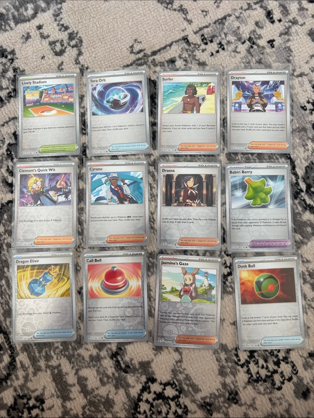 Pokémon Surging Sparks Reverse Holo Trainer Lot 12 Cards | ✨5/$25✨